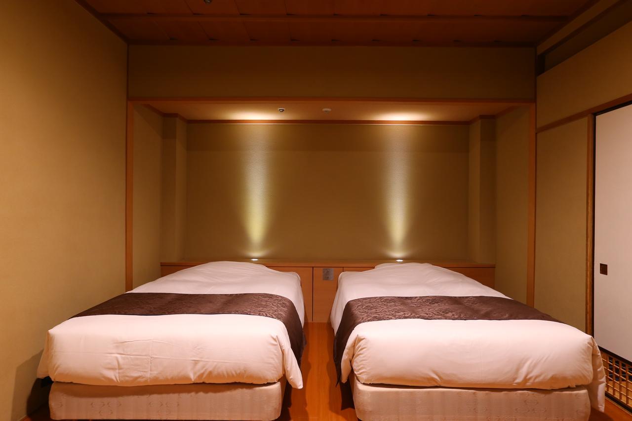 Oku Yugawara Tsubaki Hotel Bagian luar foto